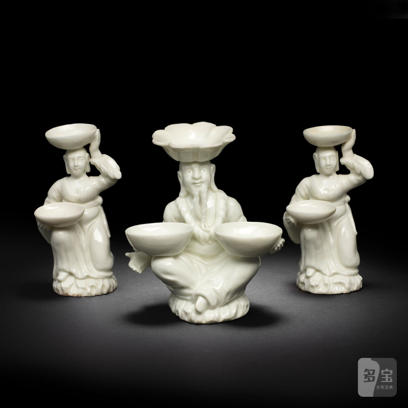 A set of three Saint-Cloud figural salts, circa 1730-40